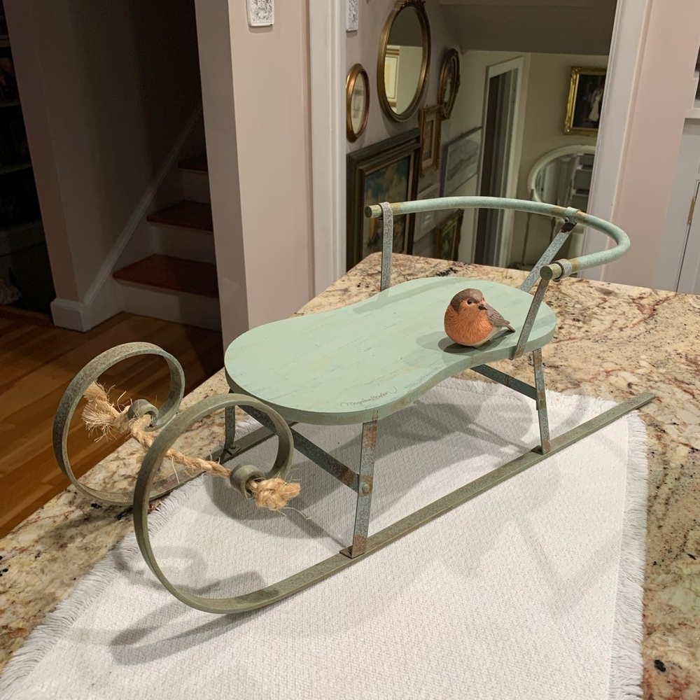 Vintage decorative sleigh with bird design